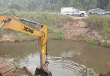 Ossada humana submersa em um córrego é localizada após prisão de casal suspeito de crime